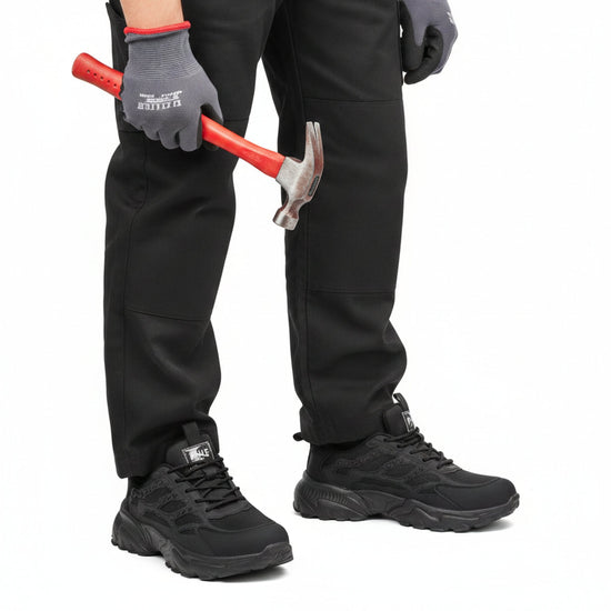 RewanPro 75Plus – damskie buty robocze S1, czarne, scena robocza z młotkiem