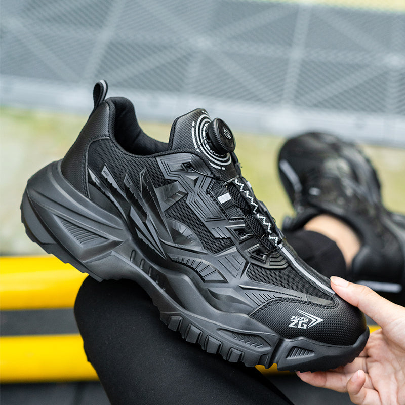 RewanPro Vortex S3 buty robocze czarne podczas pracy, klęcząc, profil antypoślizgowy SRC na stalowej podłodze