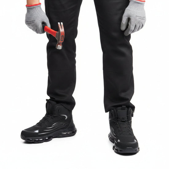 RewanPro Z91 – zimowe buty robocze S1P, czarne, scena robocza z młotkiem