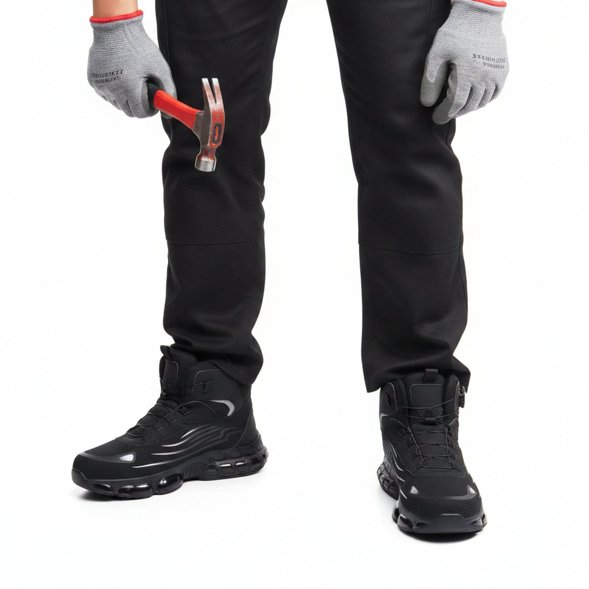 RewanPro Z91 – zimowe buty robocze S1P, czarne, scena robocza z młotkiem